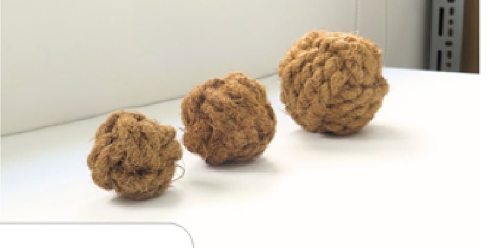 Coconut coir balls, hand-braided in three sizes