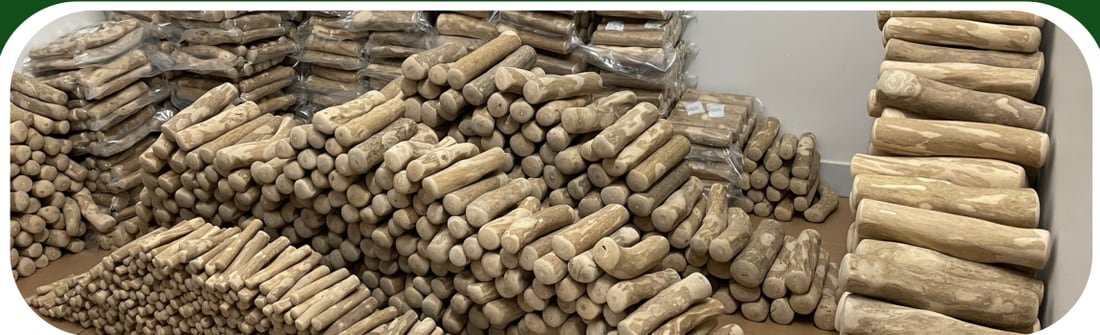 Stacked coffee wood chews, raw and vacuum-packed