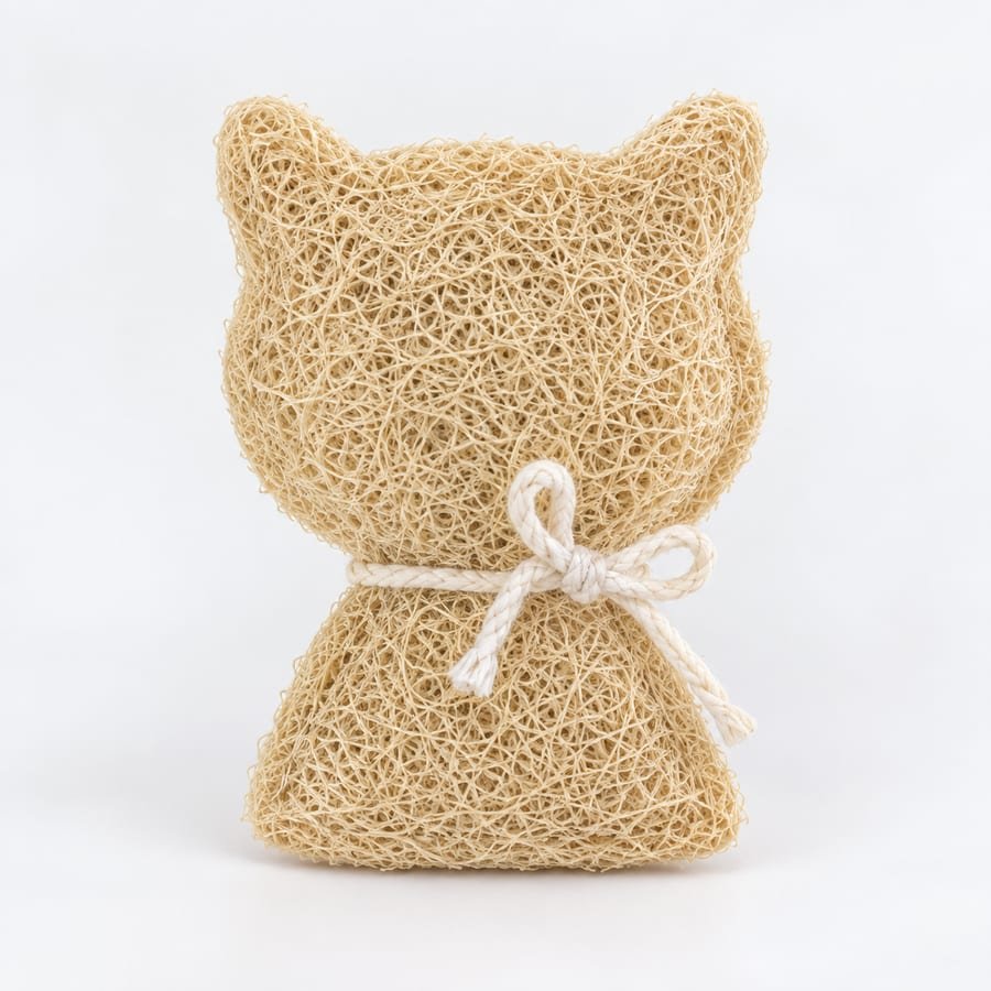 Loofah cat-shaped pet toy tied with a cotton bow