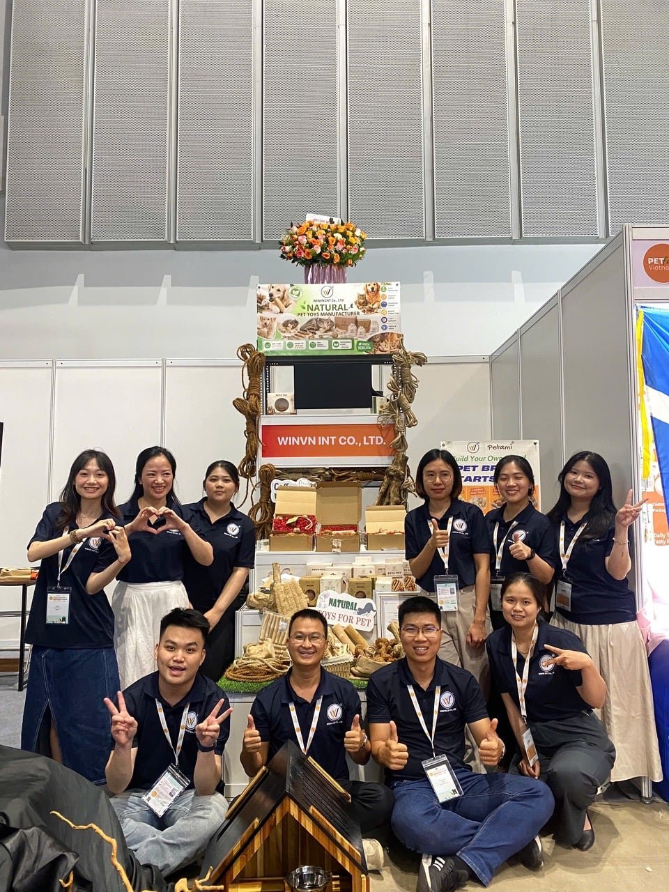WINVN INT CO., LTD booth at an international pet trade fair, with product display