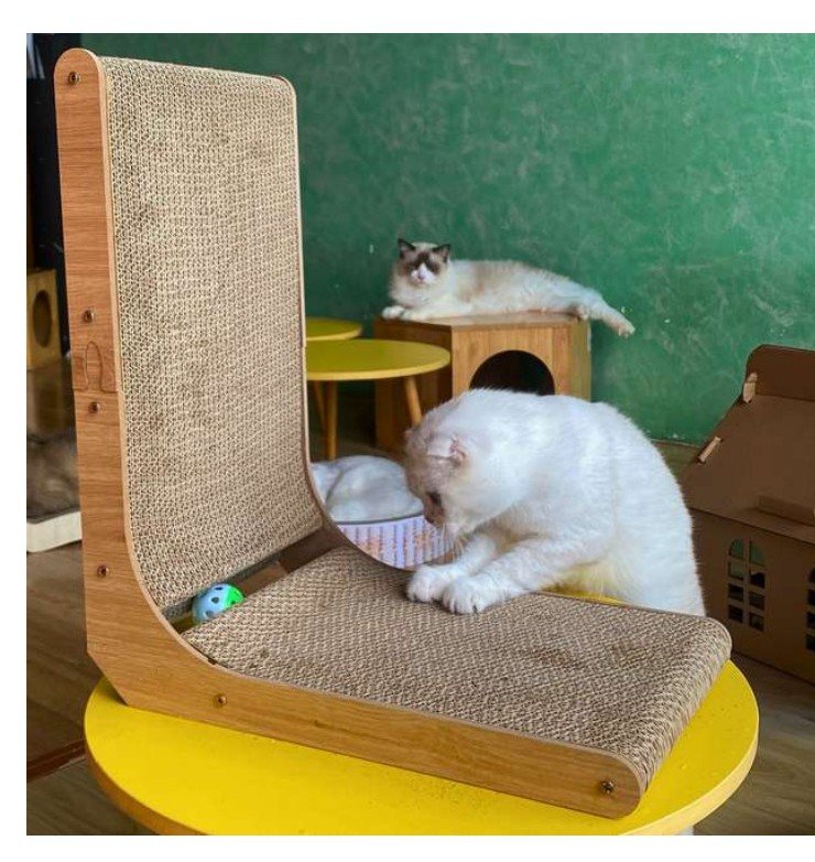 L-shape wooden cat scratcher with cat climbing on it